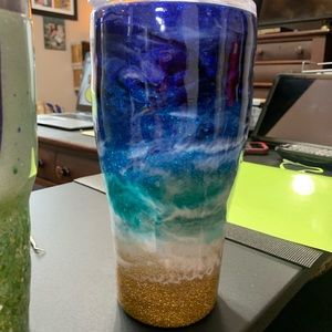 Hand made 30oz beach themed epoxy tumbler with lid. Straw included.